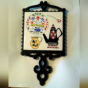 2 AVAIL VINTAGE 1950s CAST IRON TRIVETS POT HOLDERS W/ CERAMIC TILE  READ DESCRI